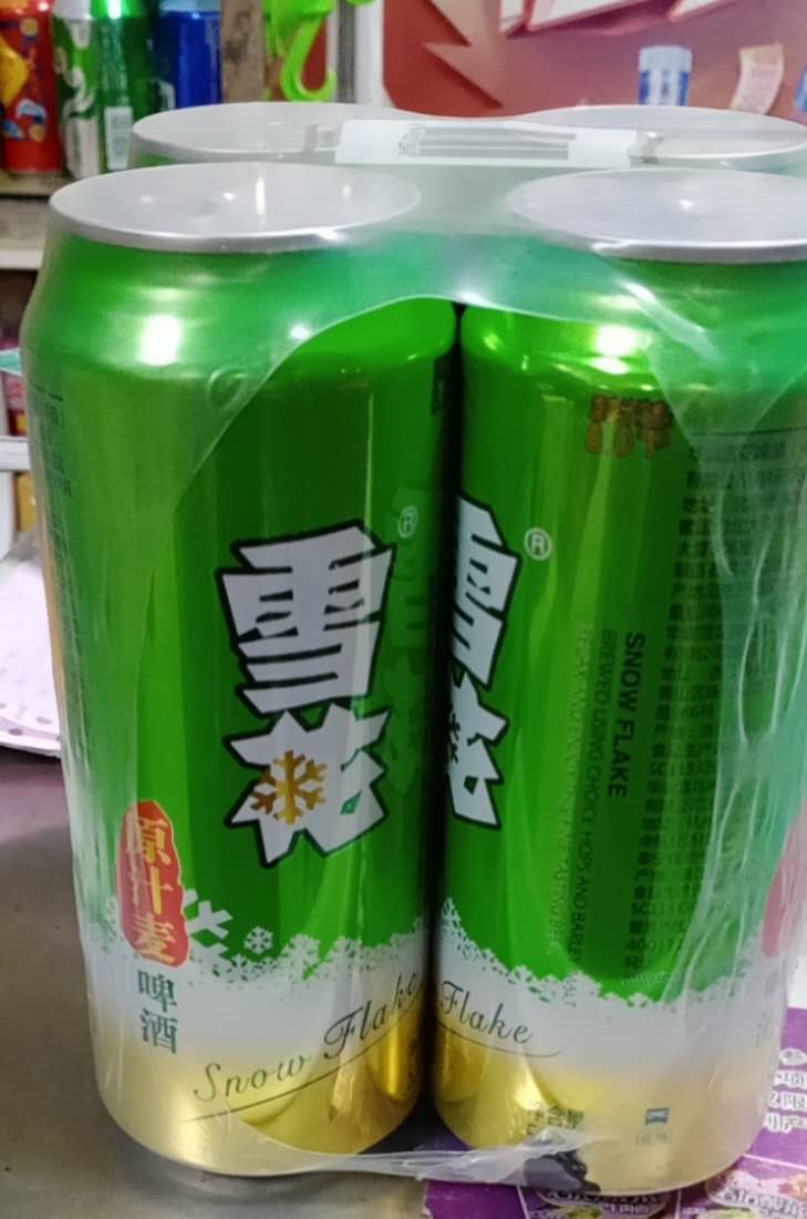 雪花啤酒绿色瓶装图片